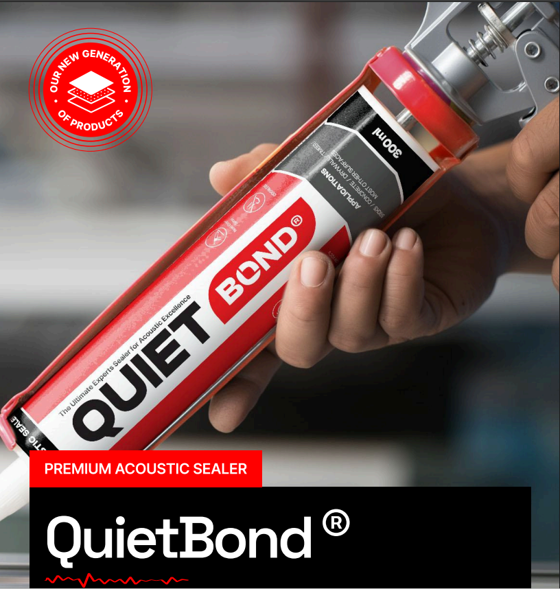 A close-up of a person holding a red and black tube of QuietBond premium acoustic sealer, with the brand name clearly visible on the label.